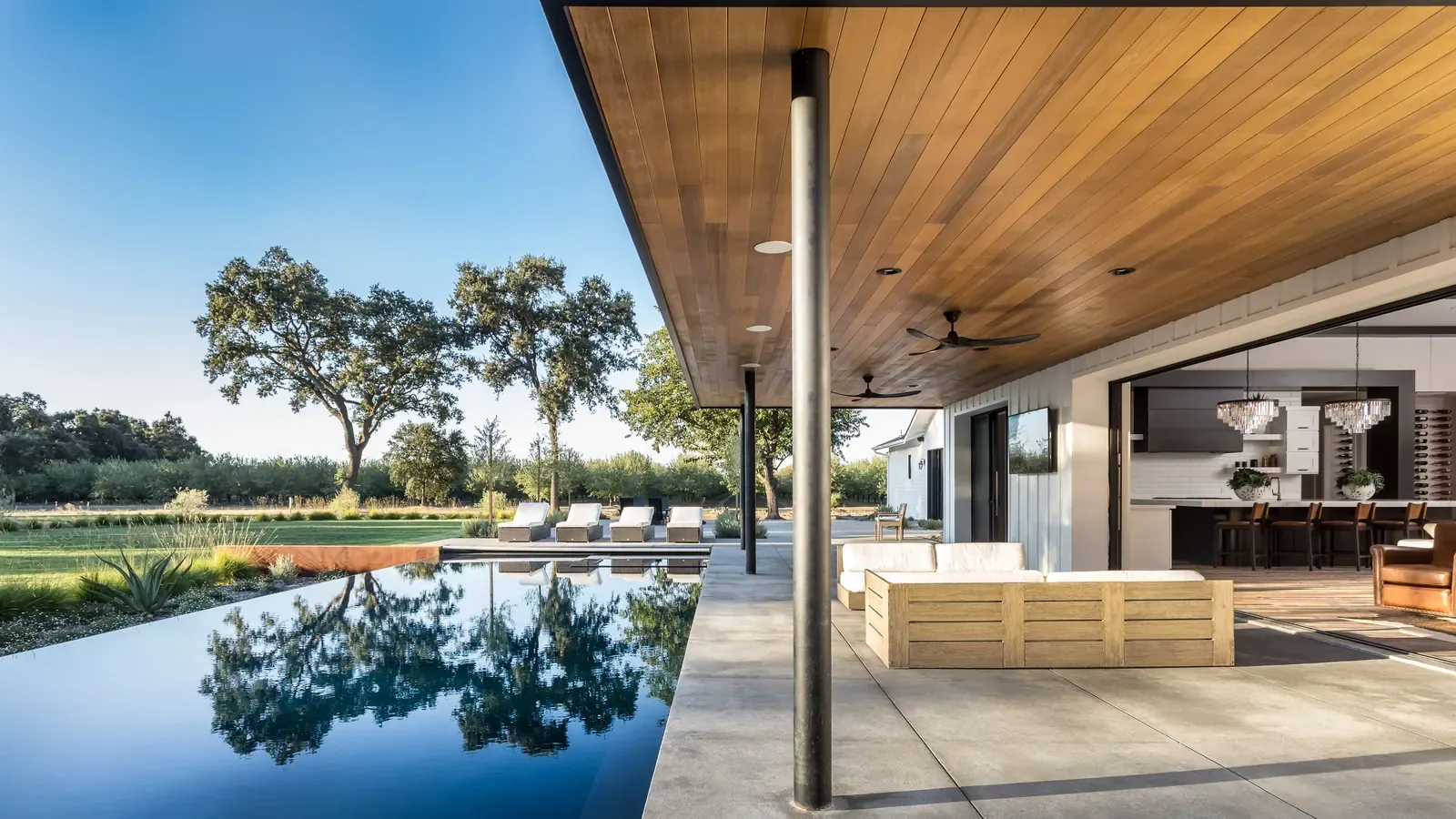 Terrace and pool under the deep timber soffit