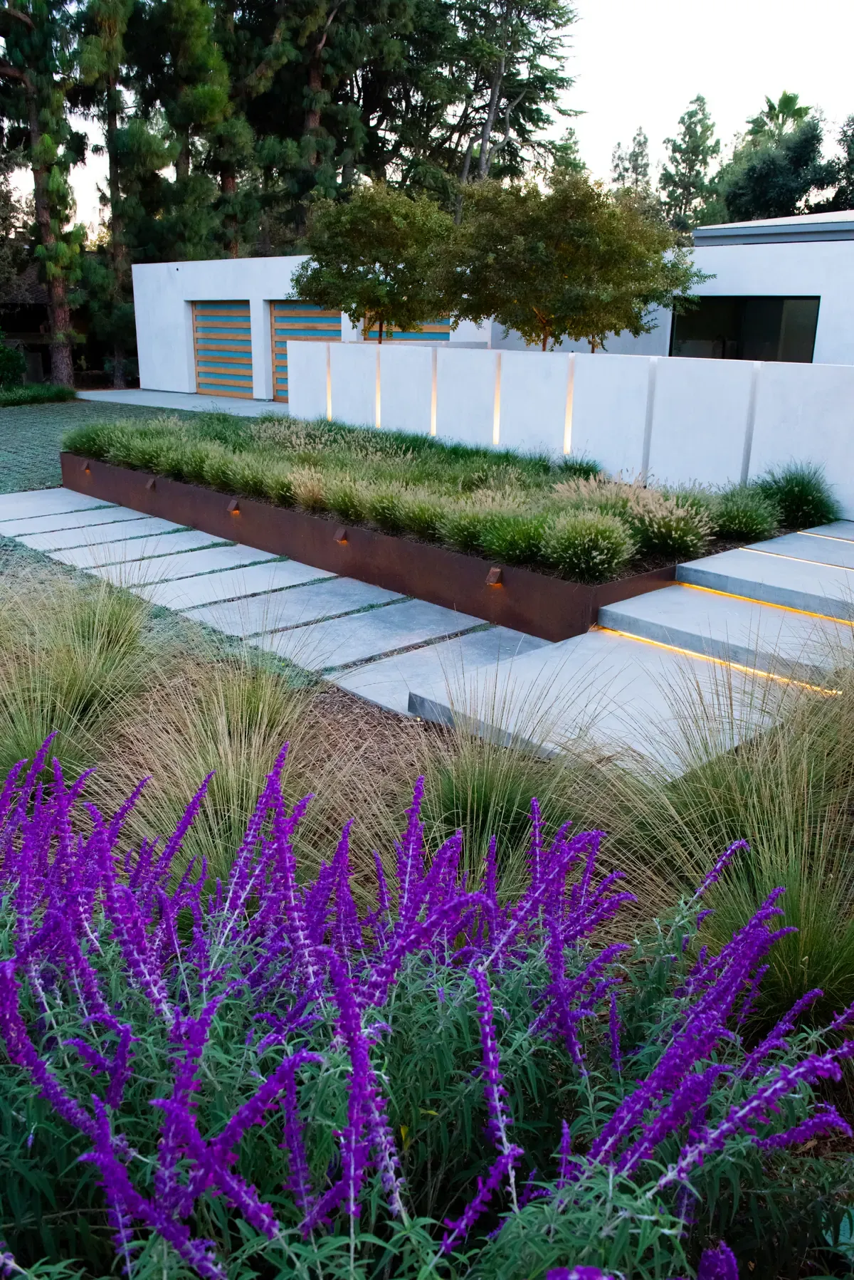 Planter and paving seen along the frontage, sage in the foreground